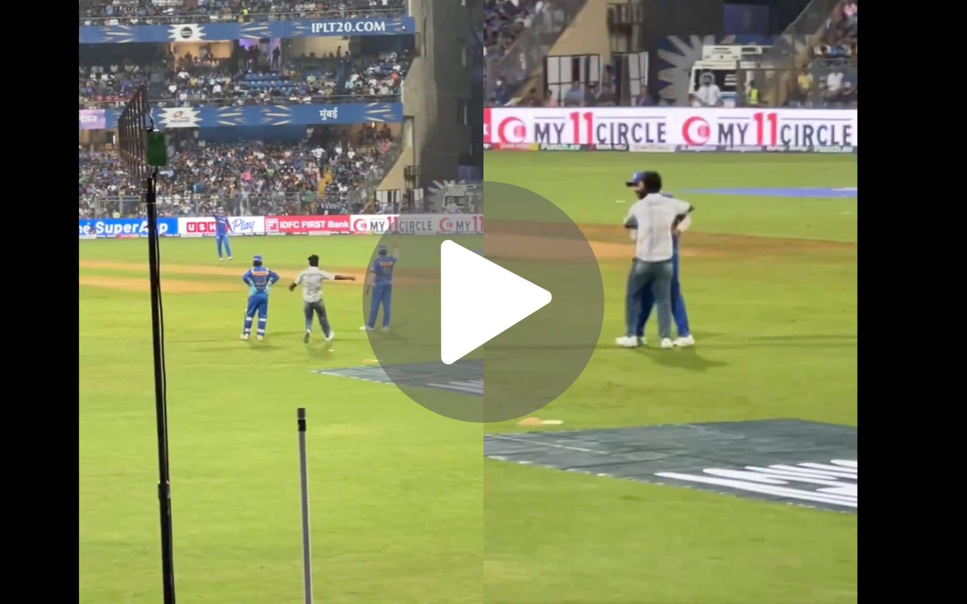 [Watch] Fan Breaks Security, Hugs Rohit Sharma During MI vs RR At Wankhede Stadium